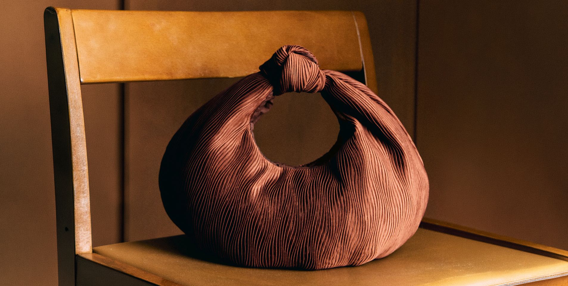Round pleated satin tote by Sézane