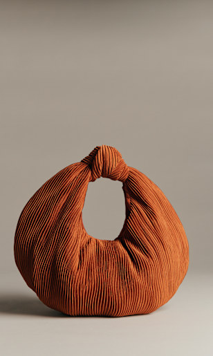 Round pleated satin tote by Sézane