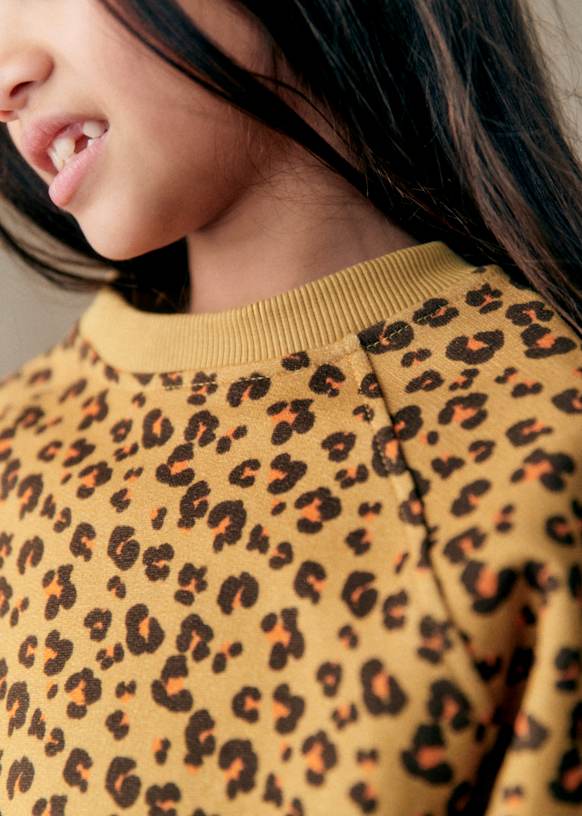 Orange leopard sweater on sale