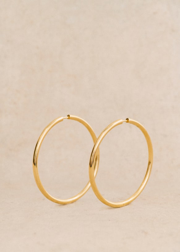 Acquista Orecchini a cerchio vintage in metallo intagliato a mano con piume Orecchini a gancio rotondi con turchese intarsiati da donna alla moda in Italia a partire da 5.1