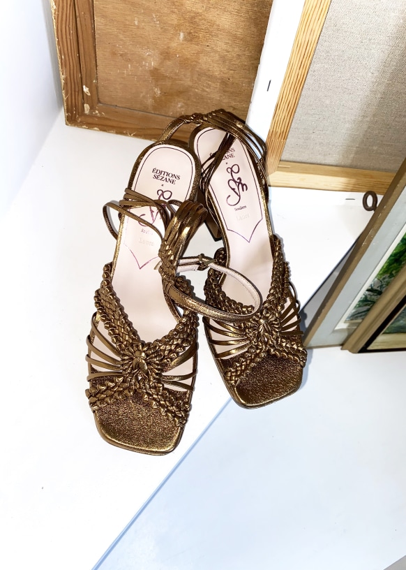 Metallic bronze leaf strap sandals with skinny heel on Craiyon