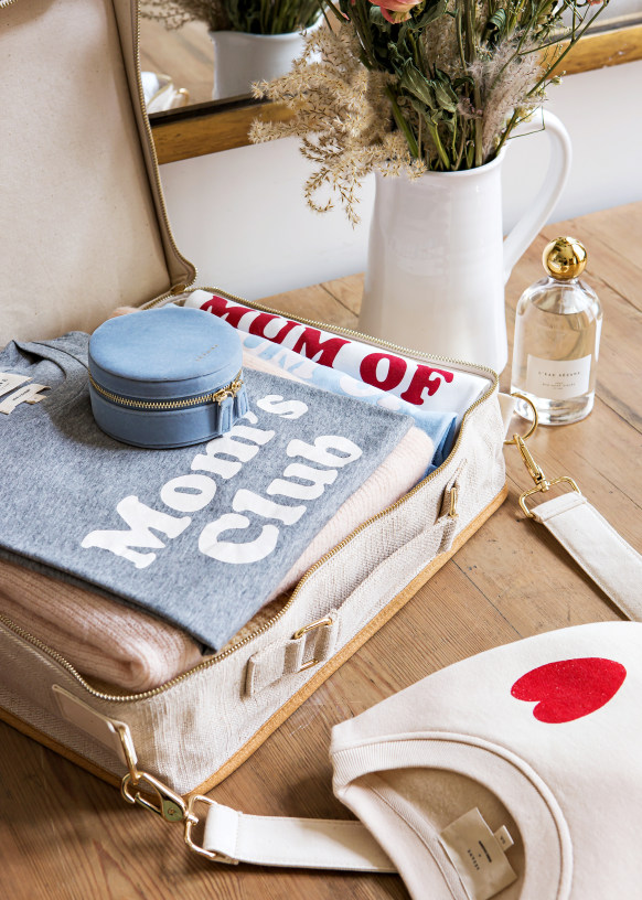 Embroidered small suitcase Italian words White Sézane