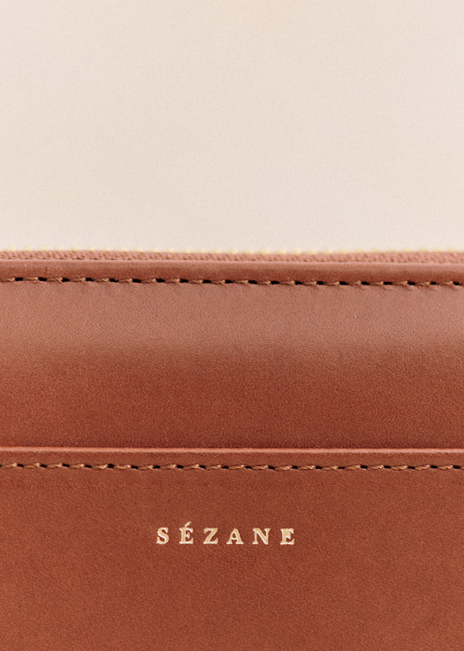 Small Leather Goods: card holders, purses and wallets Small Leather Goods: card holders, purses and wallets